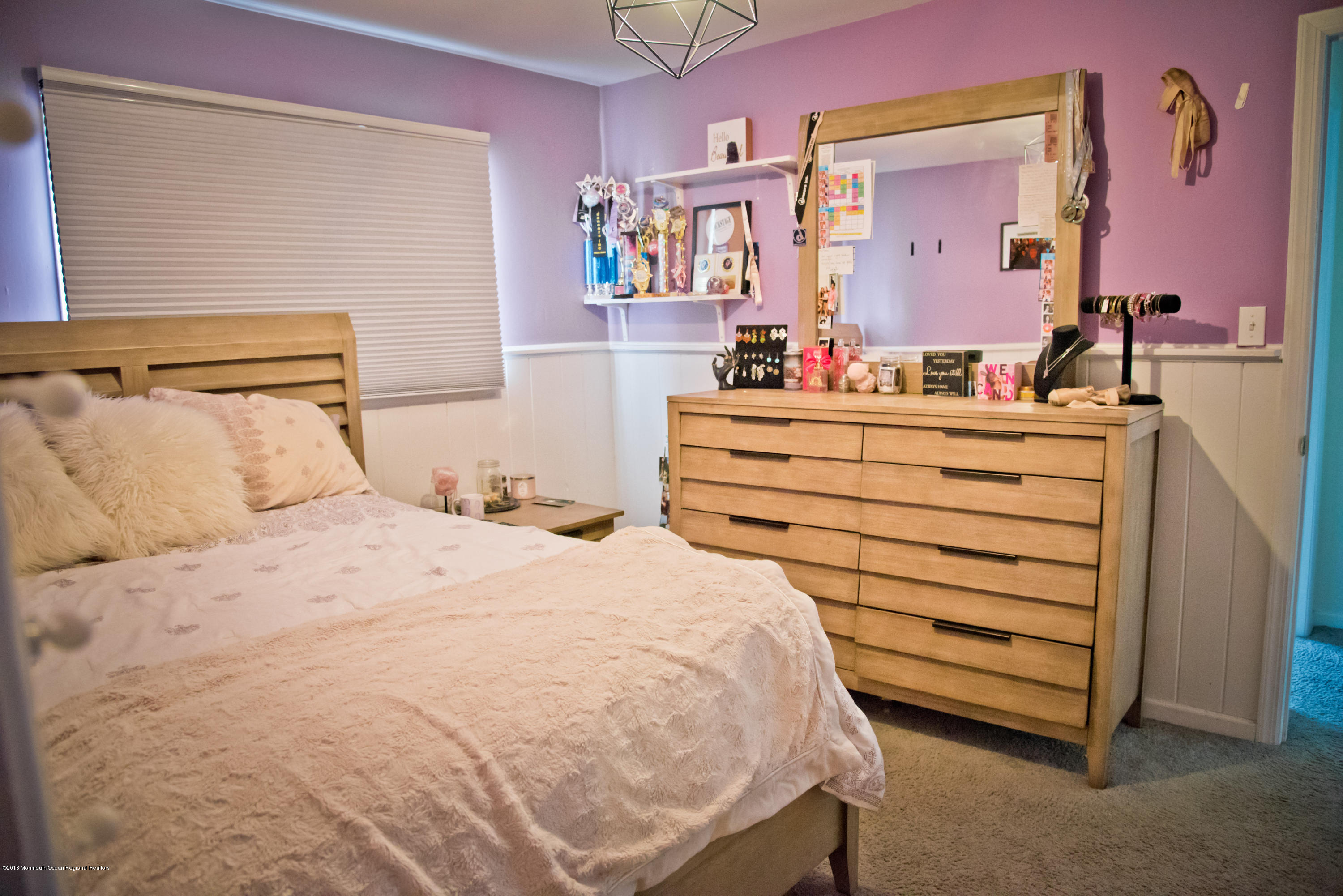 824 Beaver Dam Road Point Pleasant, NJ 08742 - Photo 19 of 35 a bed room with a bed and a mirror