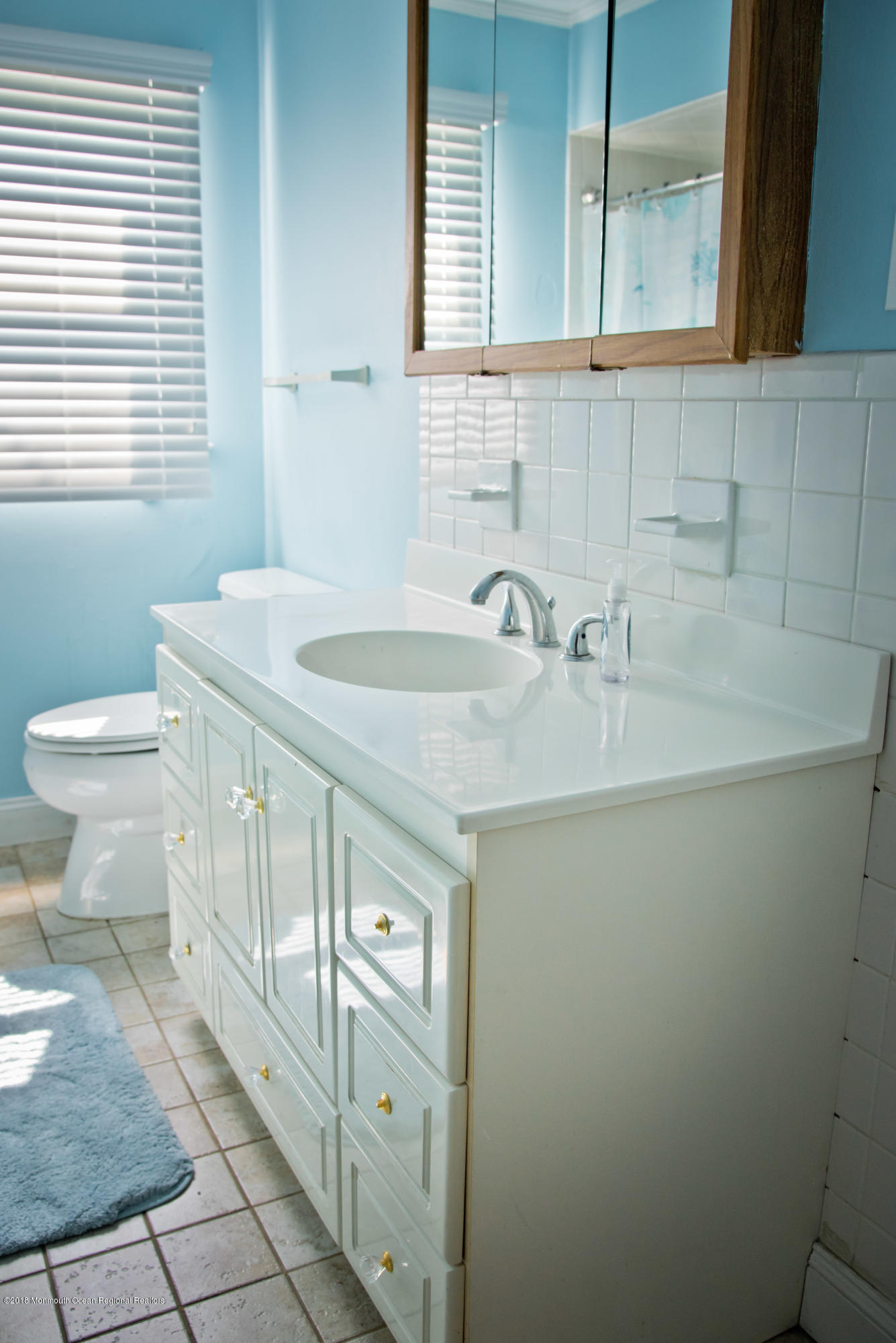 824 Beaver Dam Road Point Pleasant, NJ 08742 - Photo 20 of 35 a bathroom with a sink toilet and window