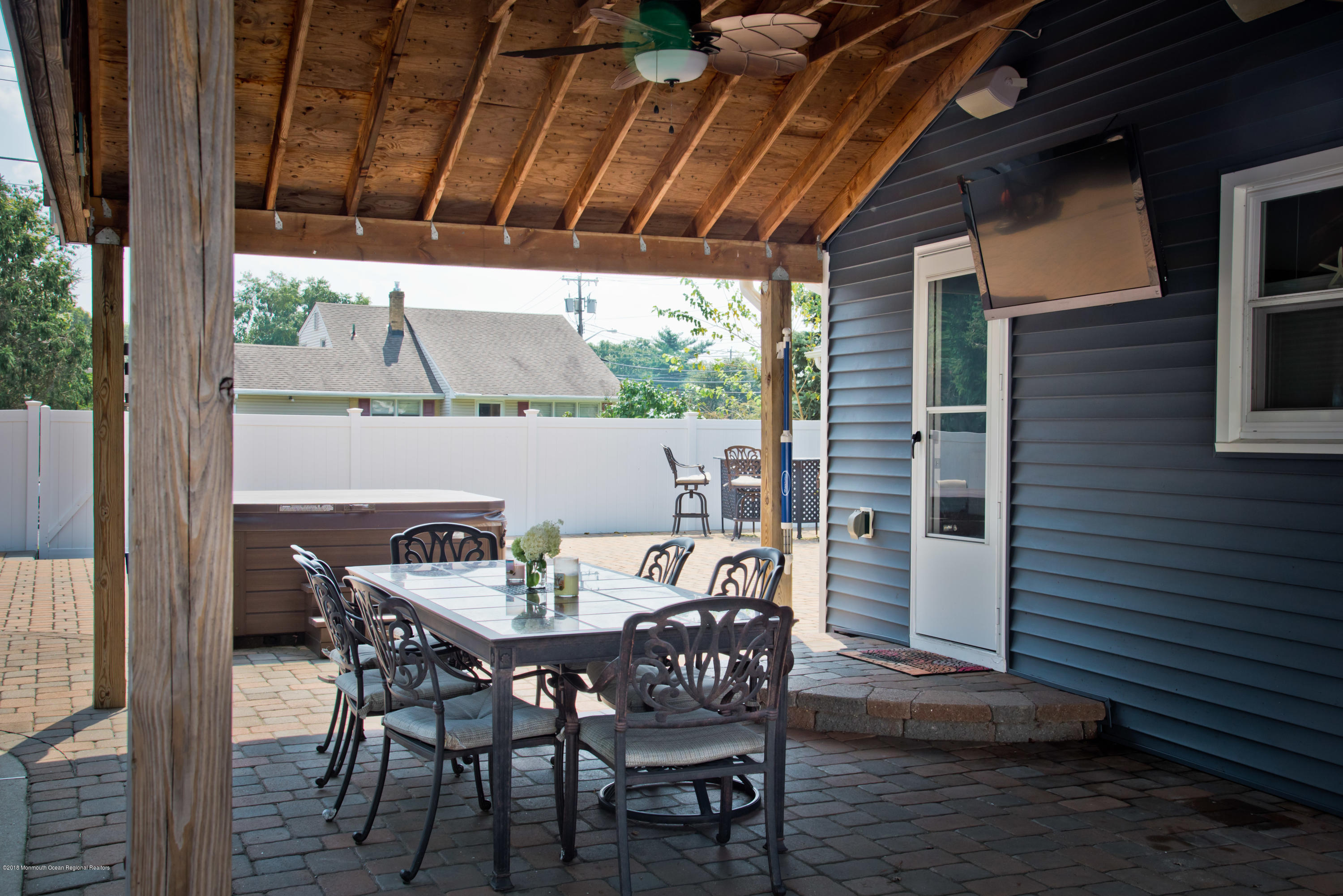 824 Beaver Dam Road Point Pleasant, NJ 08742 - Photo 30 of 35 a view of an outdoor space with a table and chairs