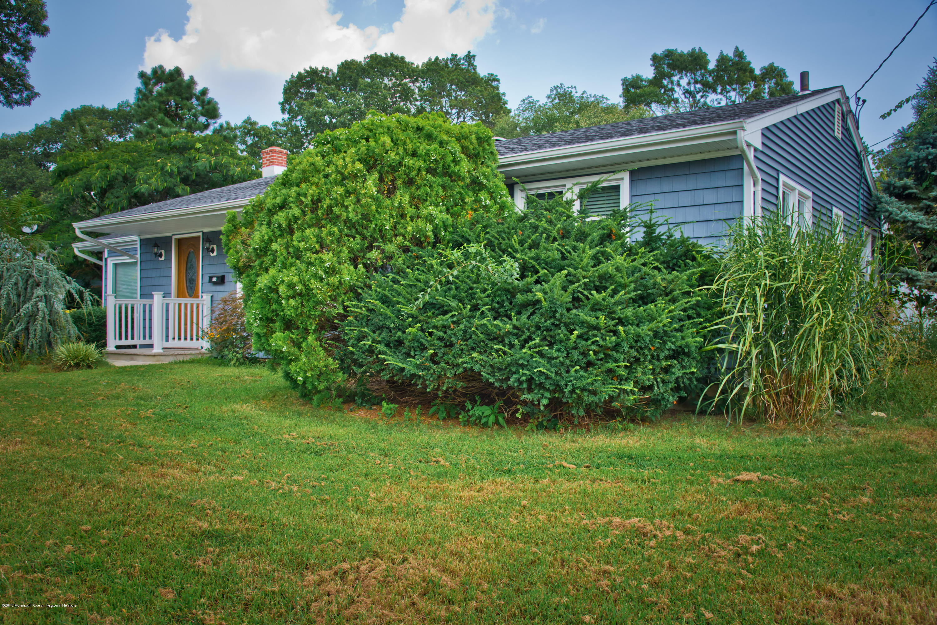 824 Beaver Dam Road Point Pleasant, NJ 08742 - Photo 4 of 35 front view of a house with a yard