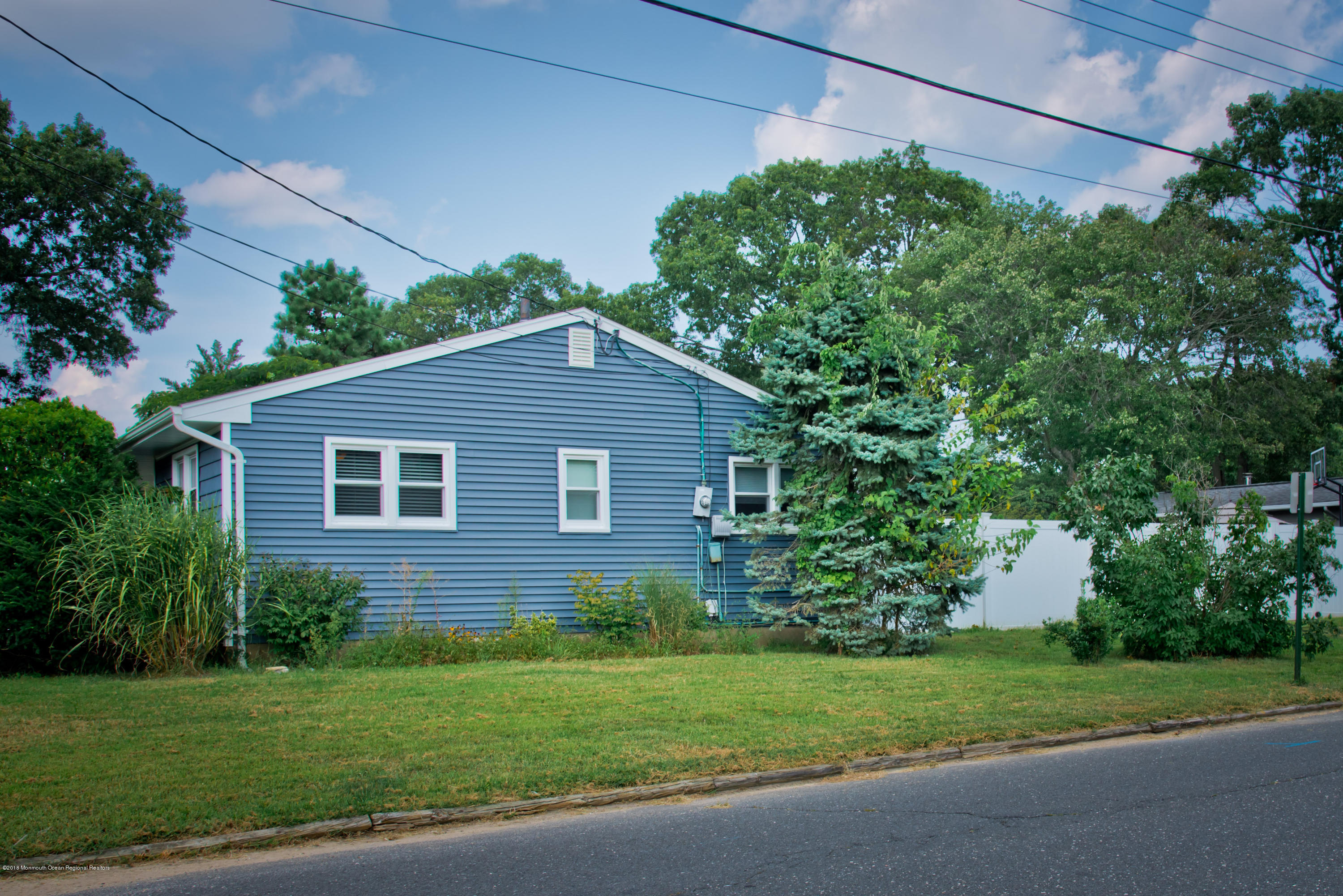 824 Beaver Dam Road Point Pleasant, NJ 08742 - Photo 5 of 35 a view of a house with a yard