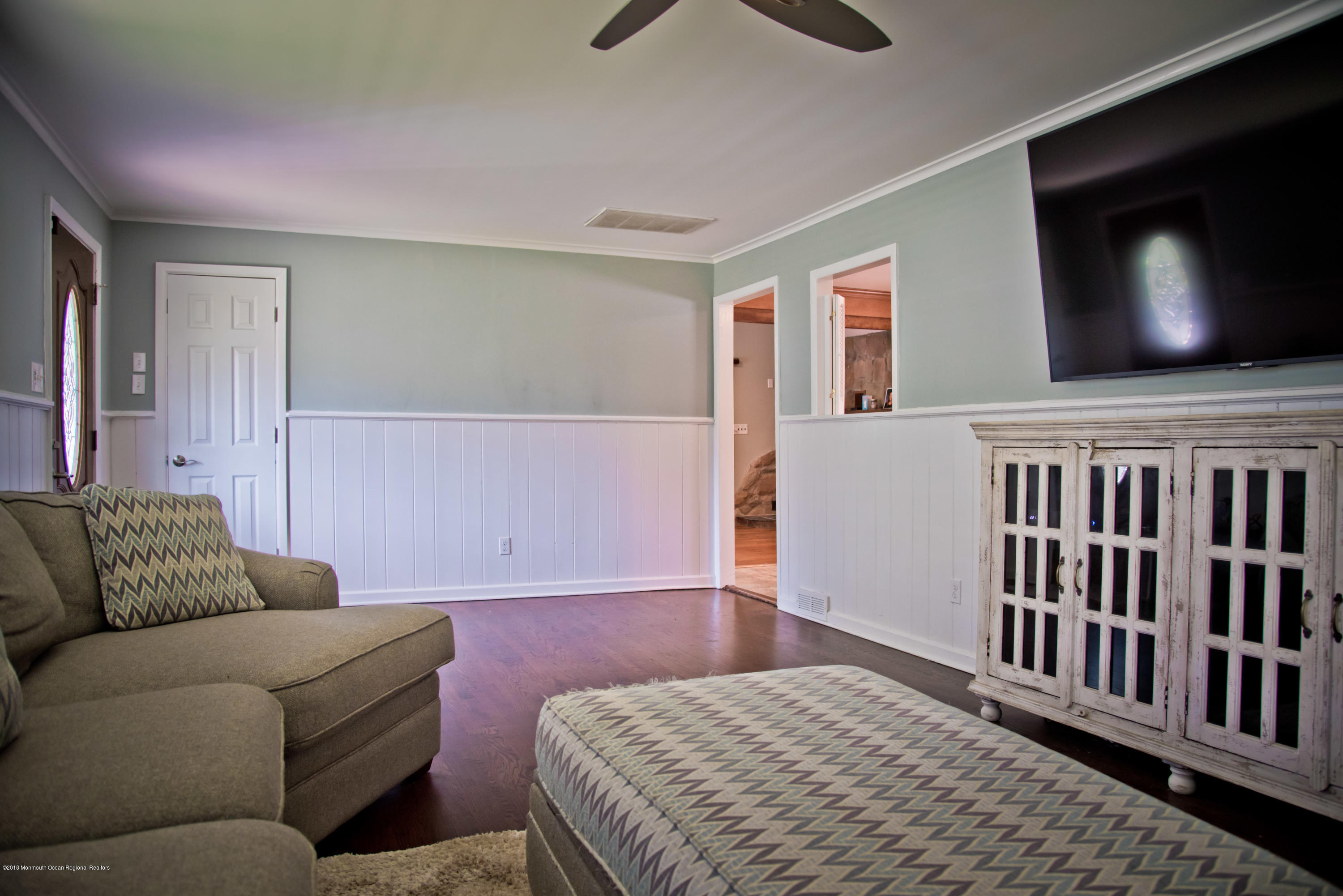 824 Beaver Dam Road Point Pleasant, NJ 08742 - Photo 8 of 35 a bedroom with furniture and a flat screen tv