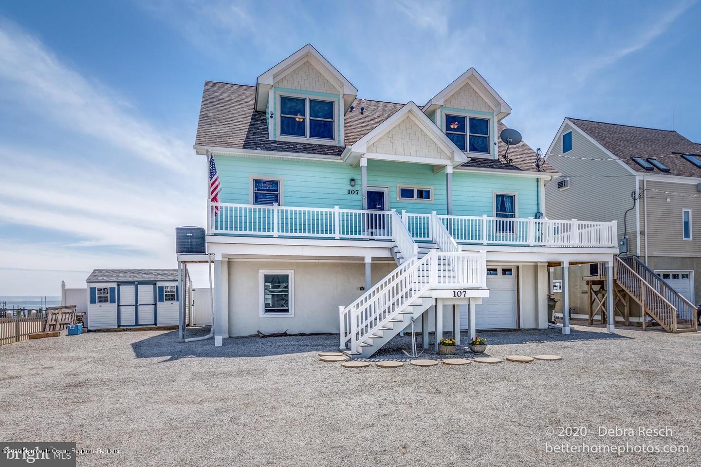 107 Parker Road Tuckerton, NJ 08087 - Photo 4 of 37 a front view of a house with a yard