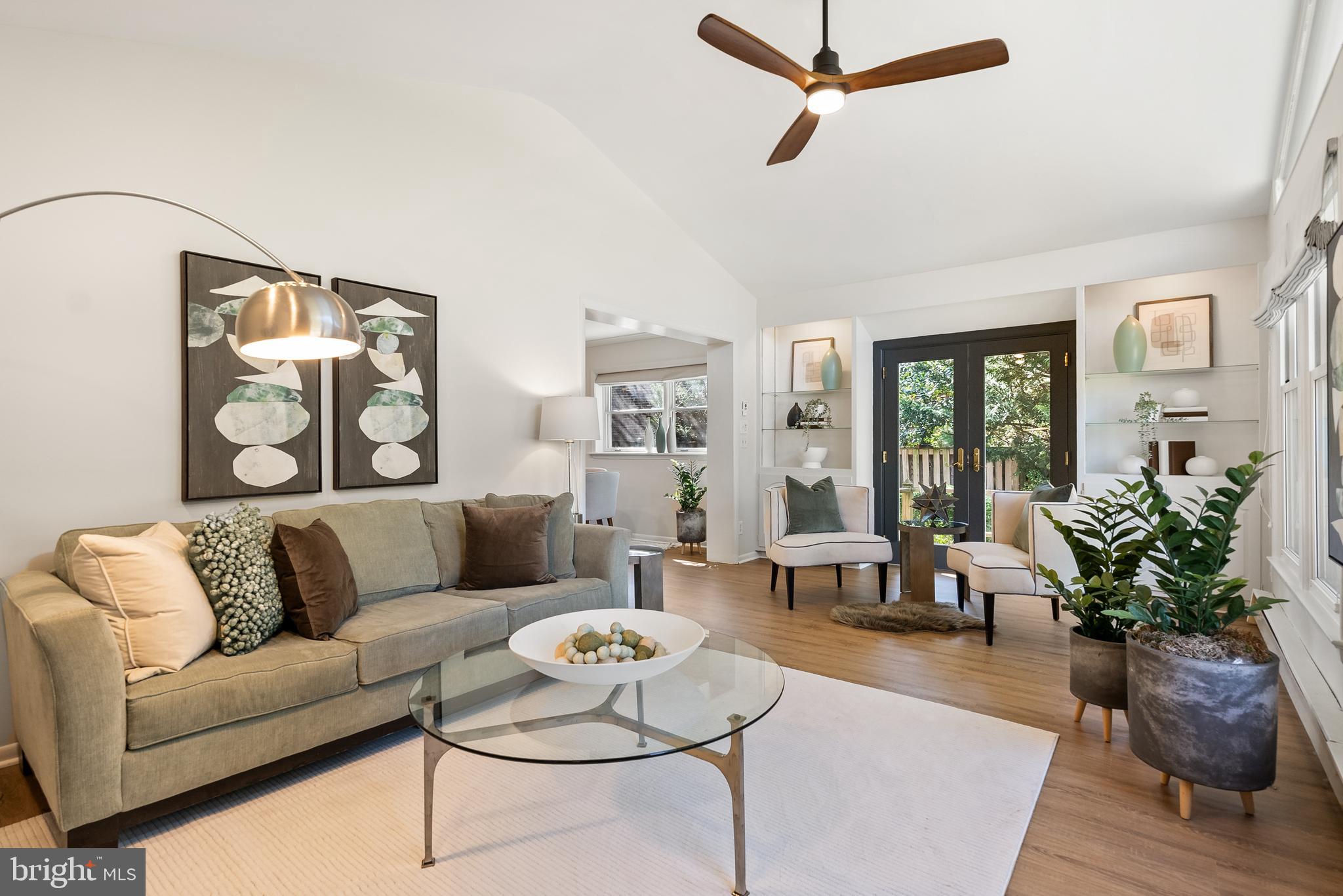 6417 Tone Drive Bethesda, MD 20817 - Photo 19 of 50 a living room with furniture or couch and a potted plant