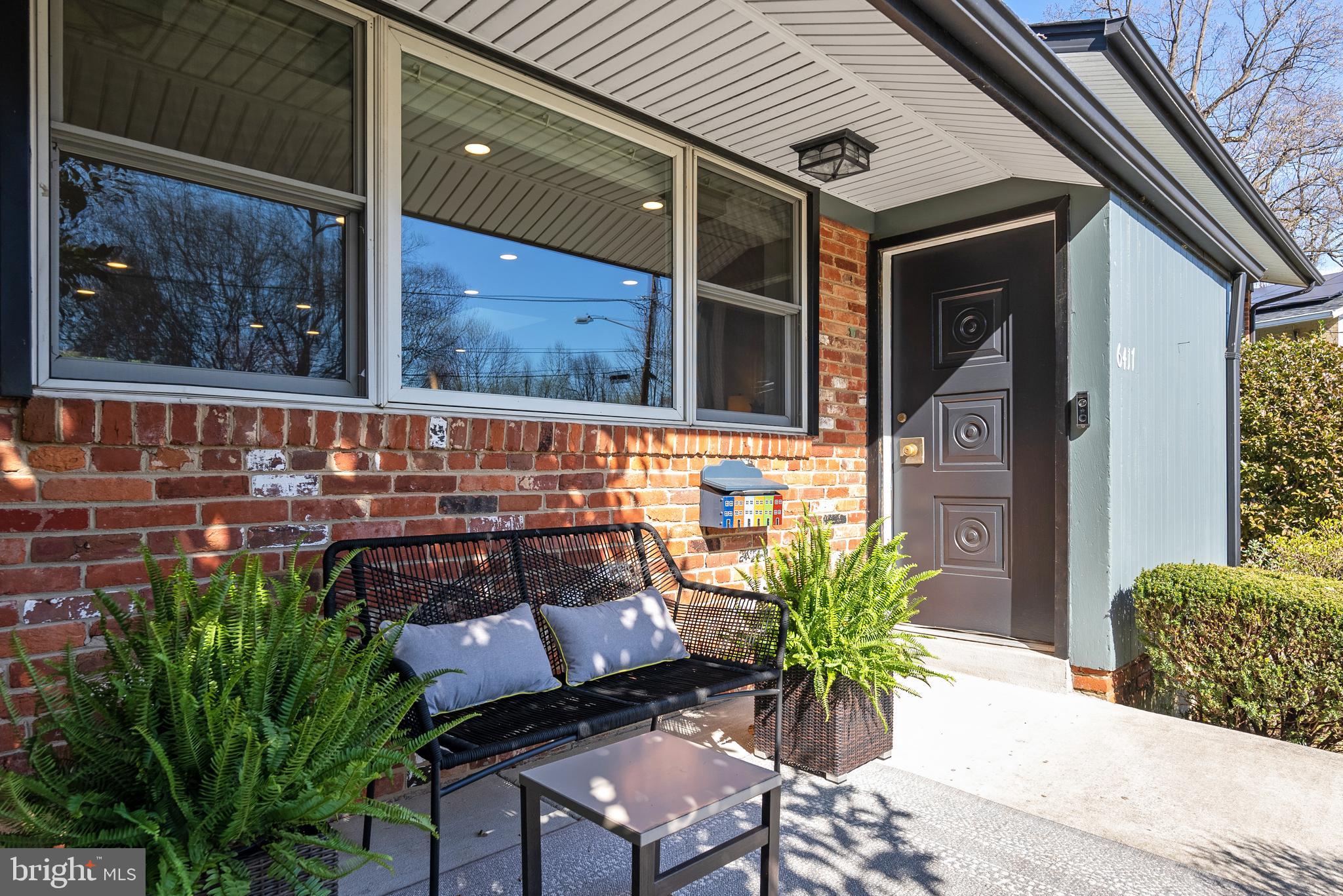 6417 Tone Drive Bethesda, MD 20817 - Photo 2 of 50 a view of a chairs and table in the patio