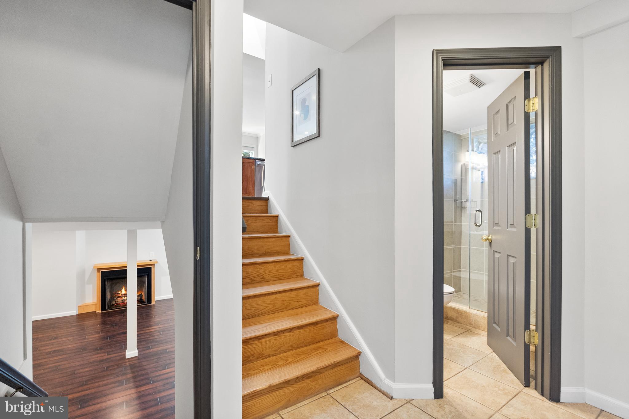 6417 Tone Drive Bethesda, MD 20817 - Photo 29 of 50 a view of a hallway with wooden floor and entryway