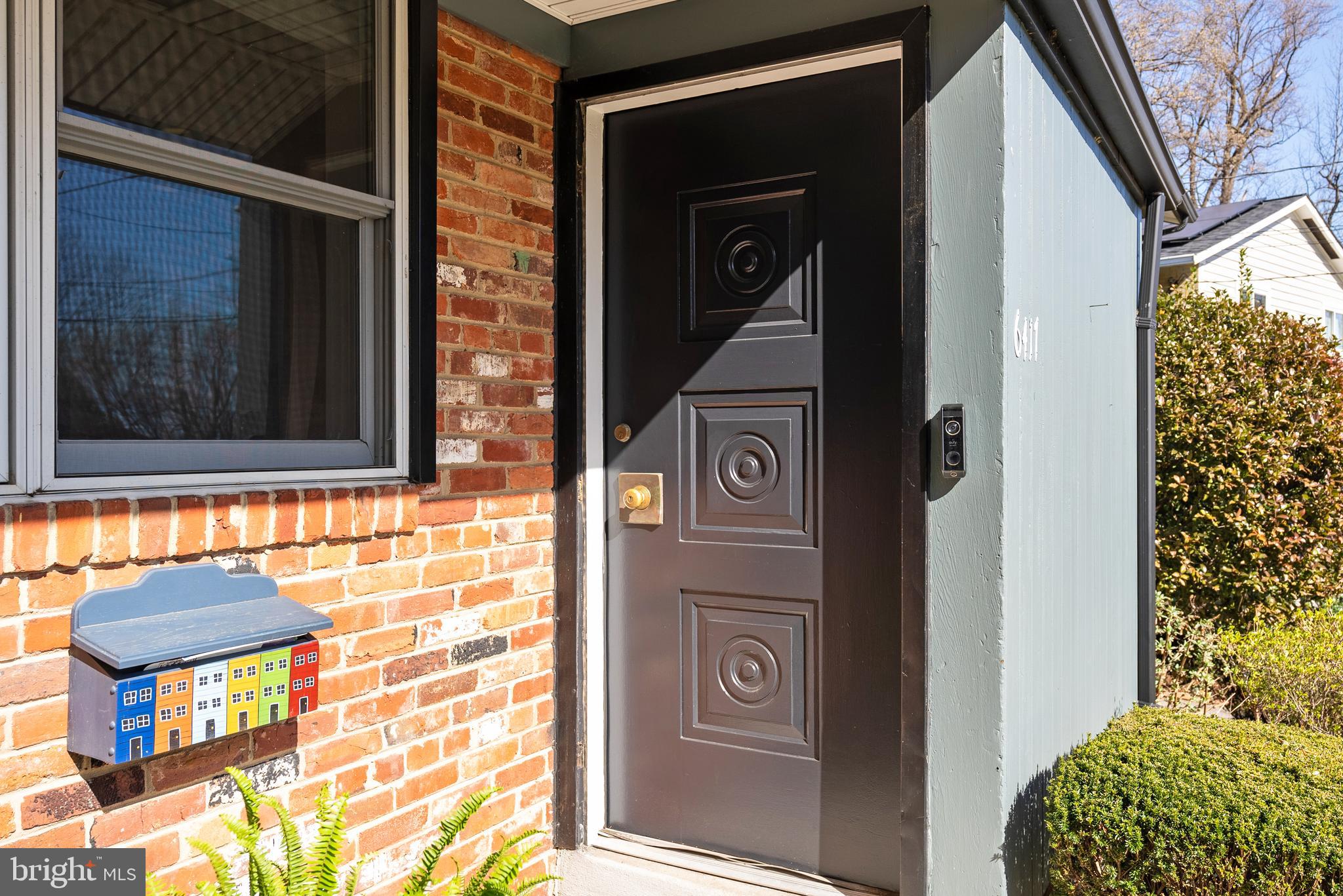 6417 Tone Drive Bethesda, MD 20817 - Photo 3 of 50 a front view of a house with street
