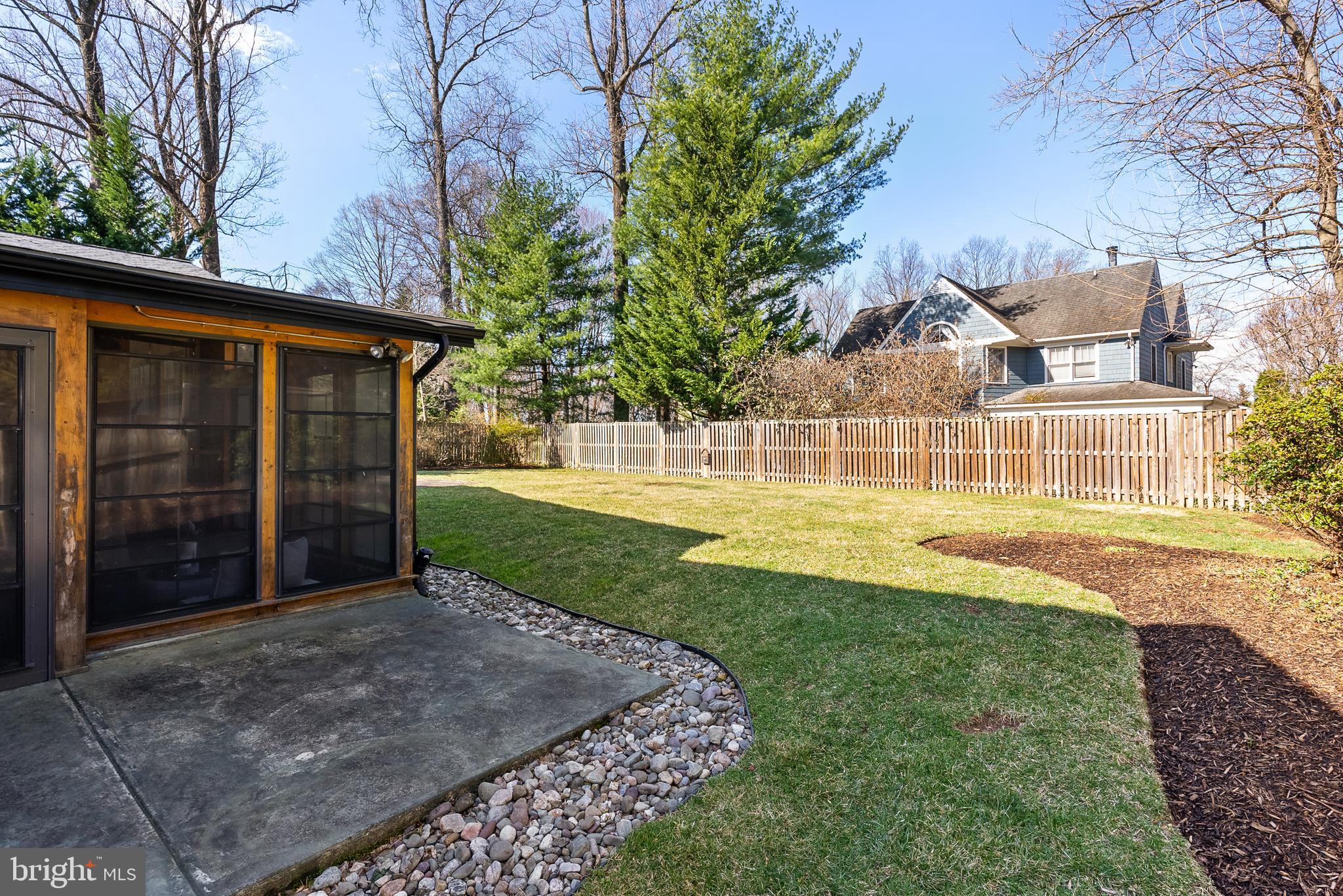 6417 Tone Drive Bethesda, MD 20817 - Photo 45 of 50 a front view of a house with a yard