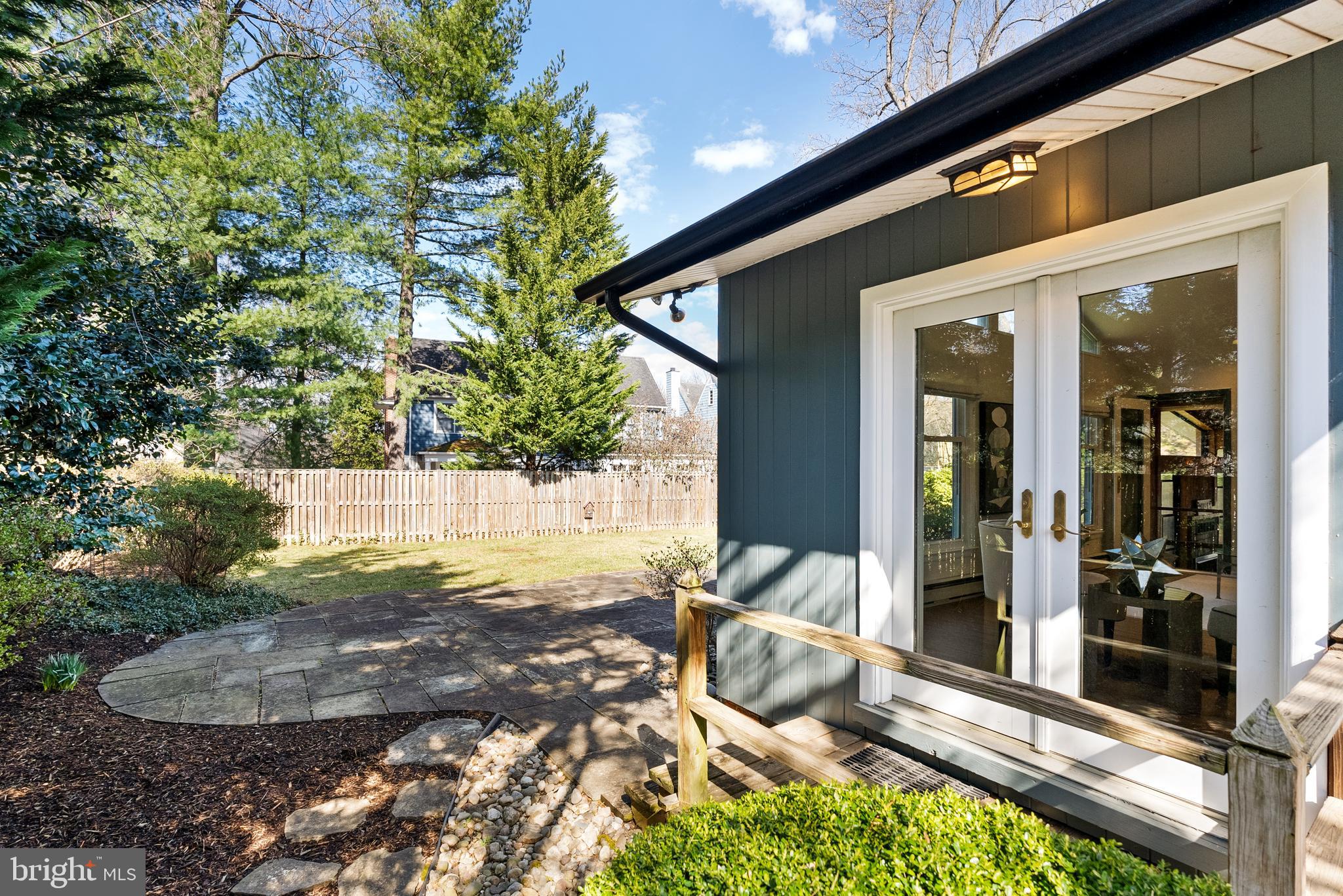6417 Tone Drive Bethesda, MD 20817 - Photo 46 of 50 a backyard of a house with yard and outdoor seating