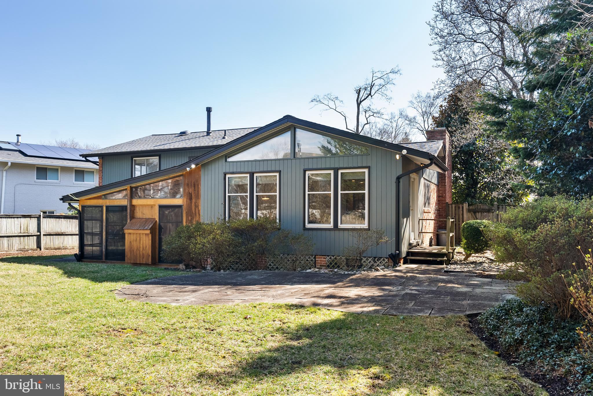 6417 Tone Drive Bethesda, MD 20817 - Photo 47 of 50 a front view of a house with a yard