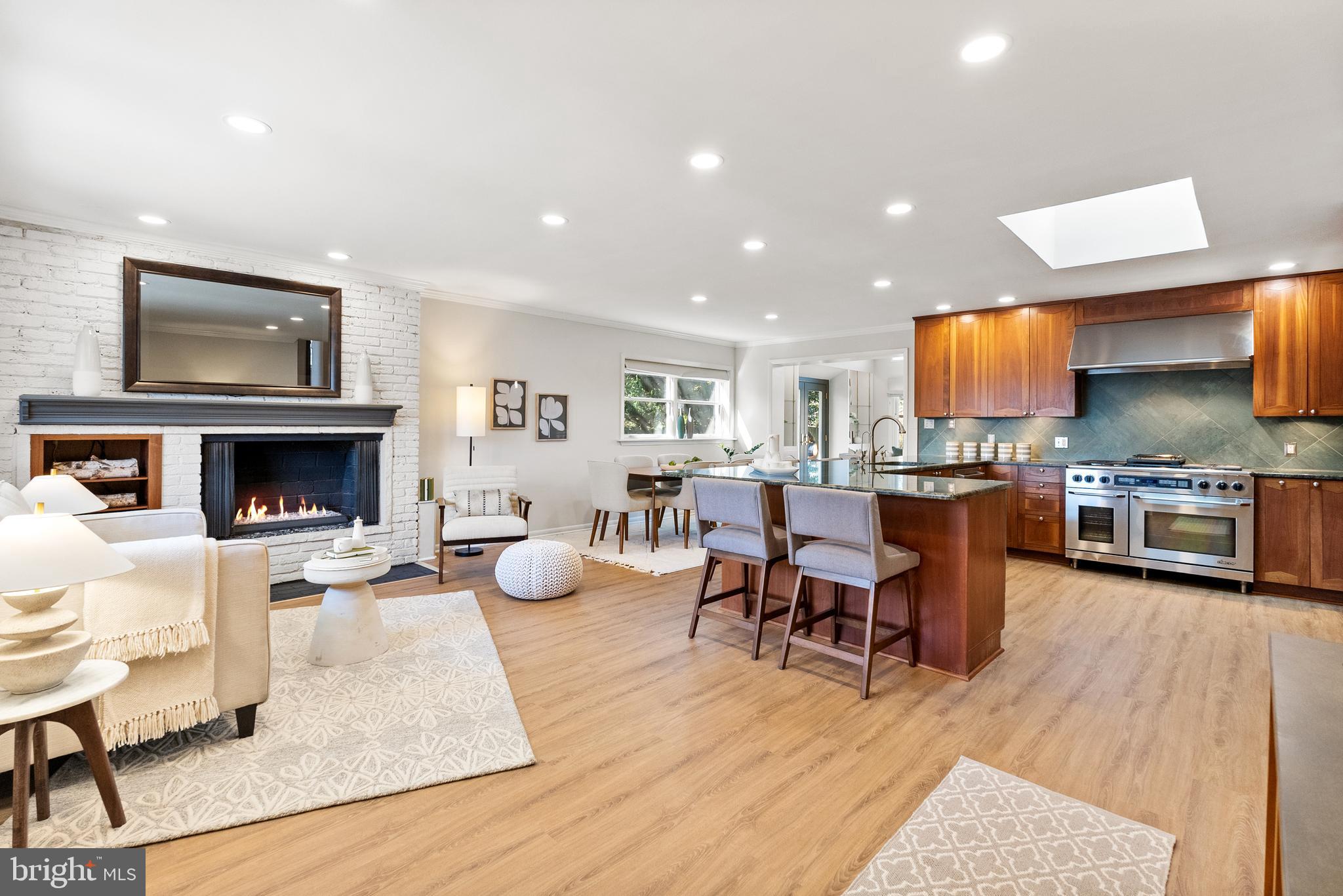 6417 Tone Drive Bethesda, MD 20817 - Photo 10 of 50 a living room with furniture and a fireplace