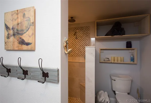 a bathroom with a toilet and a sink