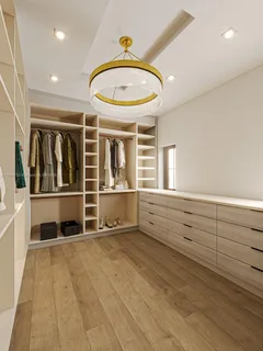 a view of a room with wooden floor and windows