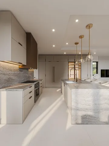 a large kitchen with stainless steel appliances kitchen island a large counter top and a wooden floors