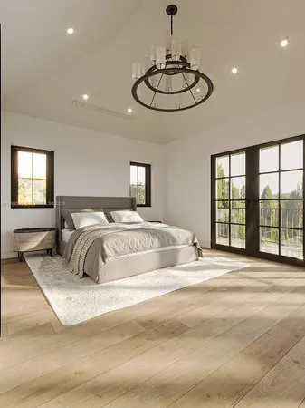 a bedroom with a large bed and a chandelier