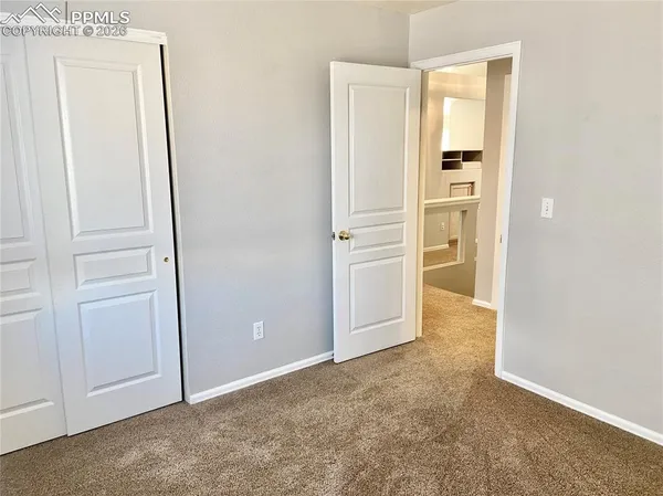 an empty room with closet