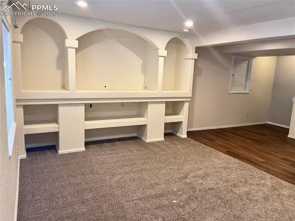 a view of room with two sinks and a window