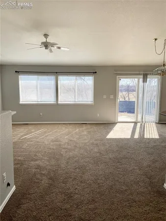view of an empty room with a window