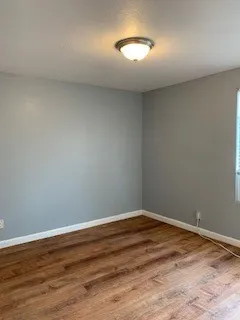 a bathroom with a sink a mirror and vanity