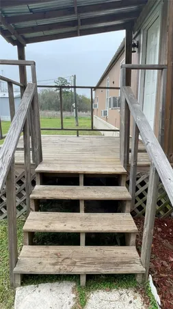 a view of a livingroom with furniture and window