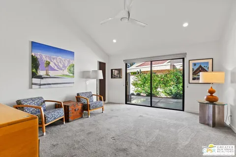 a large bathroom with a double vanity sink mirror and bathtub