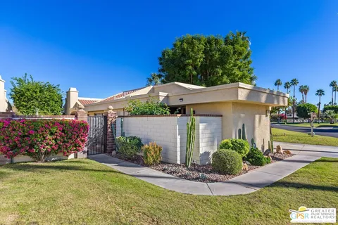 a view of a house with a swimming pool