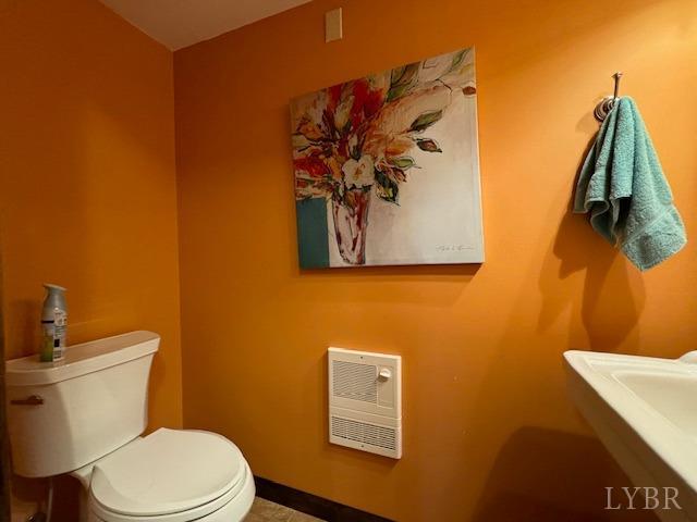 2459 Country Club Road Appomattox, VA 24522 - Photo 28 of 54 a bathroom with a toilet and a sink