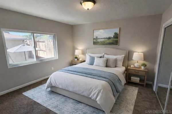 a bedroom with bed and a window