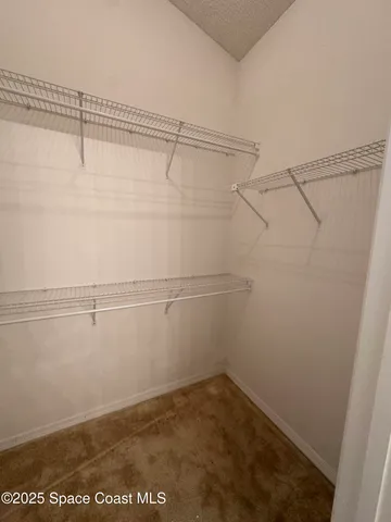 a view of a room with racks on the wall