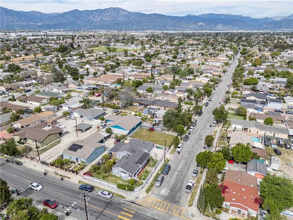 an aerial view of residential house and an outdoor space