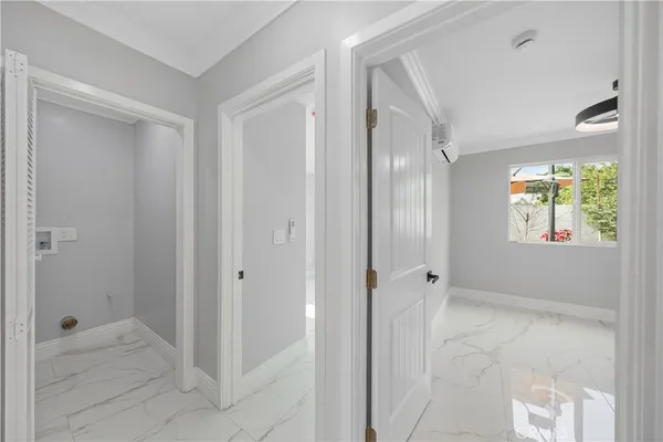 a bathroom with a shower and a glass door