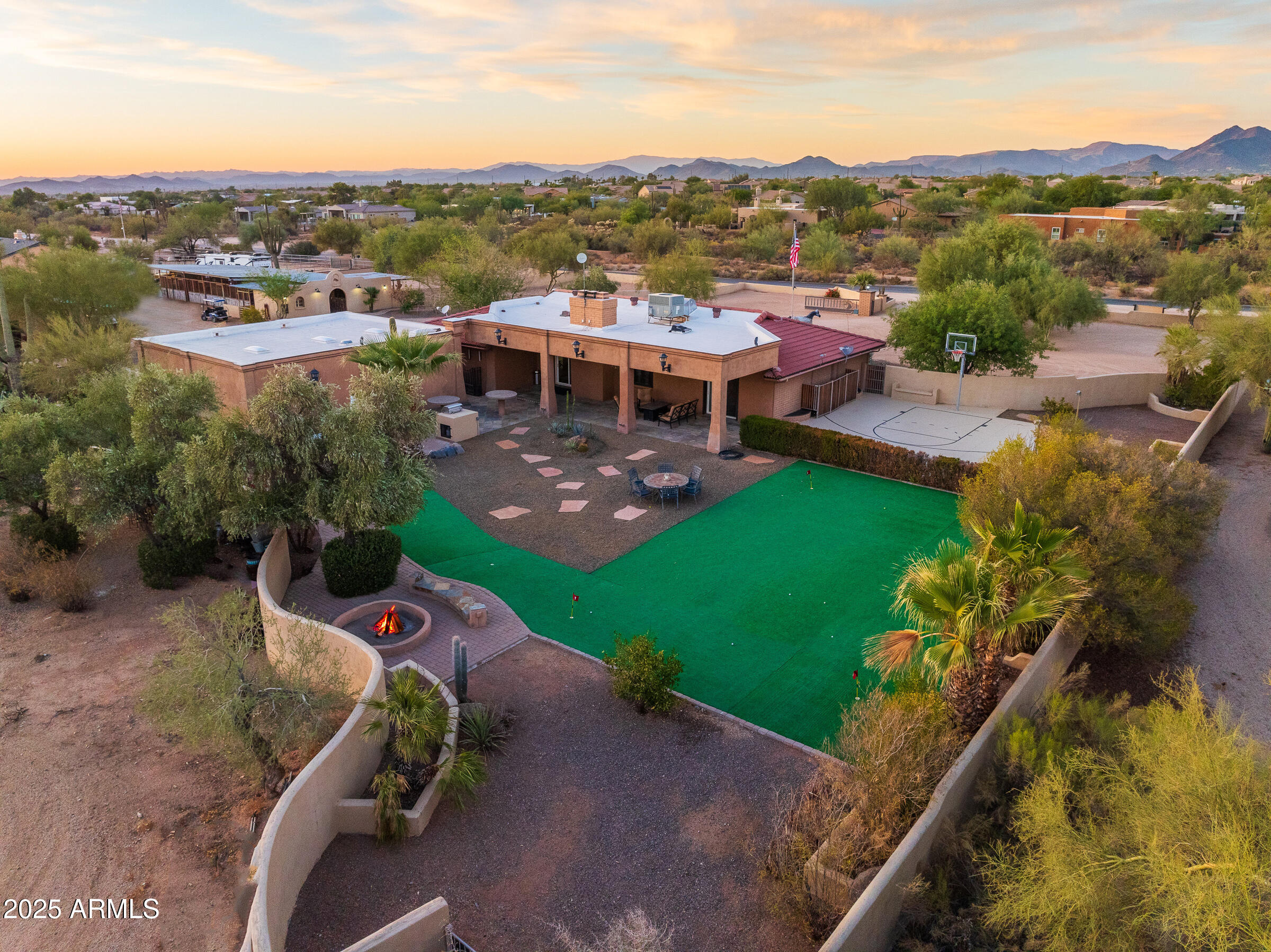 6835 East Peak View Road Scottsdale, AZ 85266 - Photo 43 of 107 an aerial view of a house with a garden