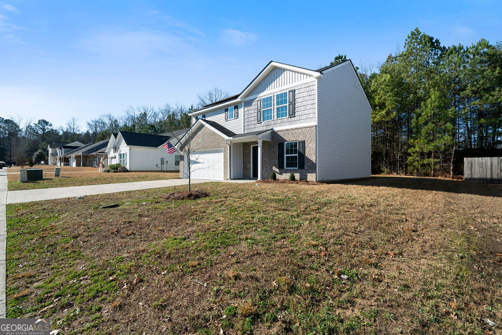 21 Walton Creek Drive Southwest Rome, GA 30165 - Photo 3 of 26 a view of a house with a yard