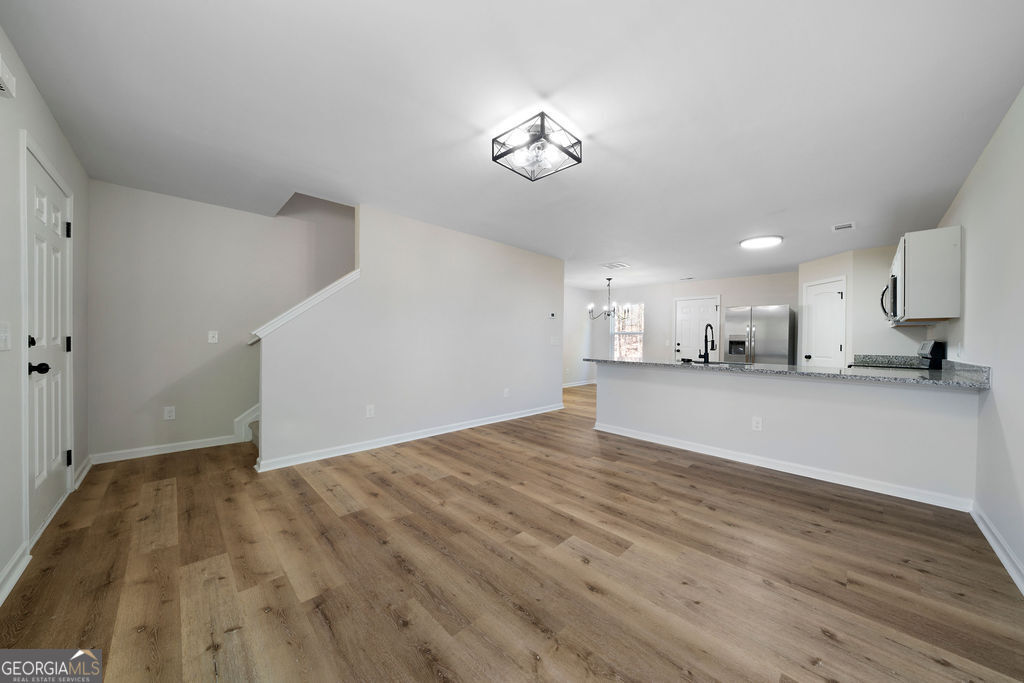 21 Walton Creek Drive Southwest Rome, GA 30165 - Photo 5 of 26 a view of an empty room and kitchen view