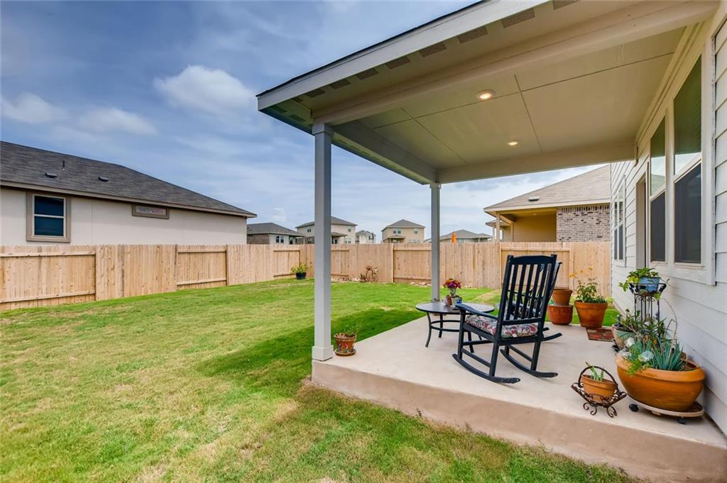 105 Tucana Street Georgetown, TX 78628 - Photo 15 of 17 Fenced backyard featuring a patio area