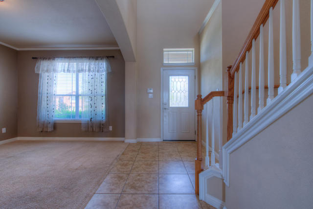 321 Limestone Trail Austin, TX 78737 - Photo 6 of 28 a view of entryway with window and stairs