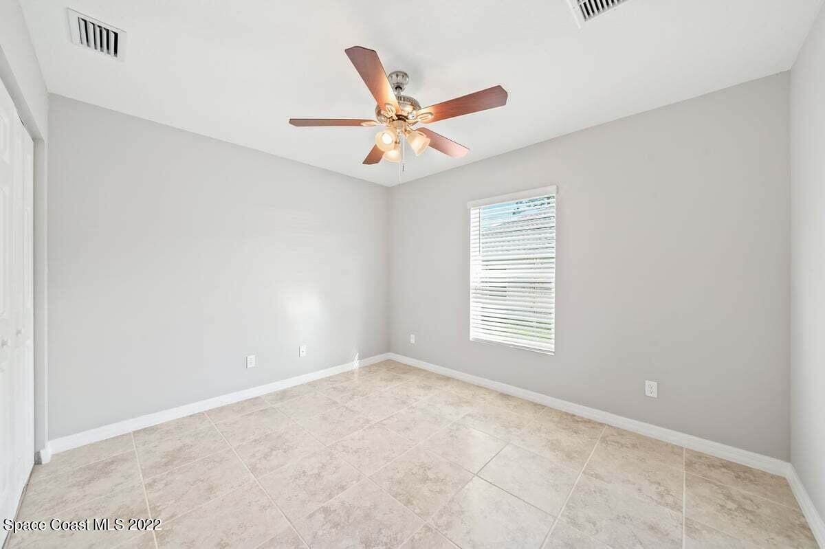 1111 Ver Circle Northeast Palm Bay, FL 32905 - Photo 22 of 30 a view of an empty room with a window