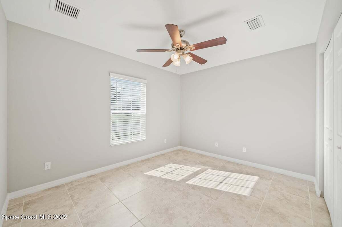 1111 Ver Circle Northeast Palm Bay, FL 32905 - Photo 23 of 30 a view of an empty room with a window