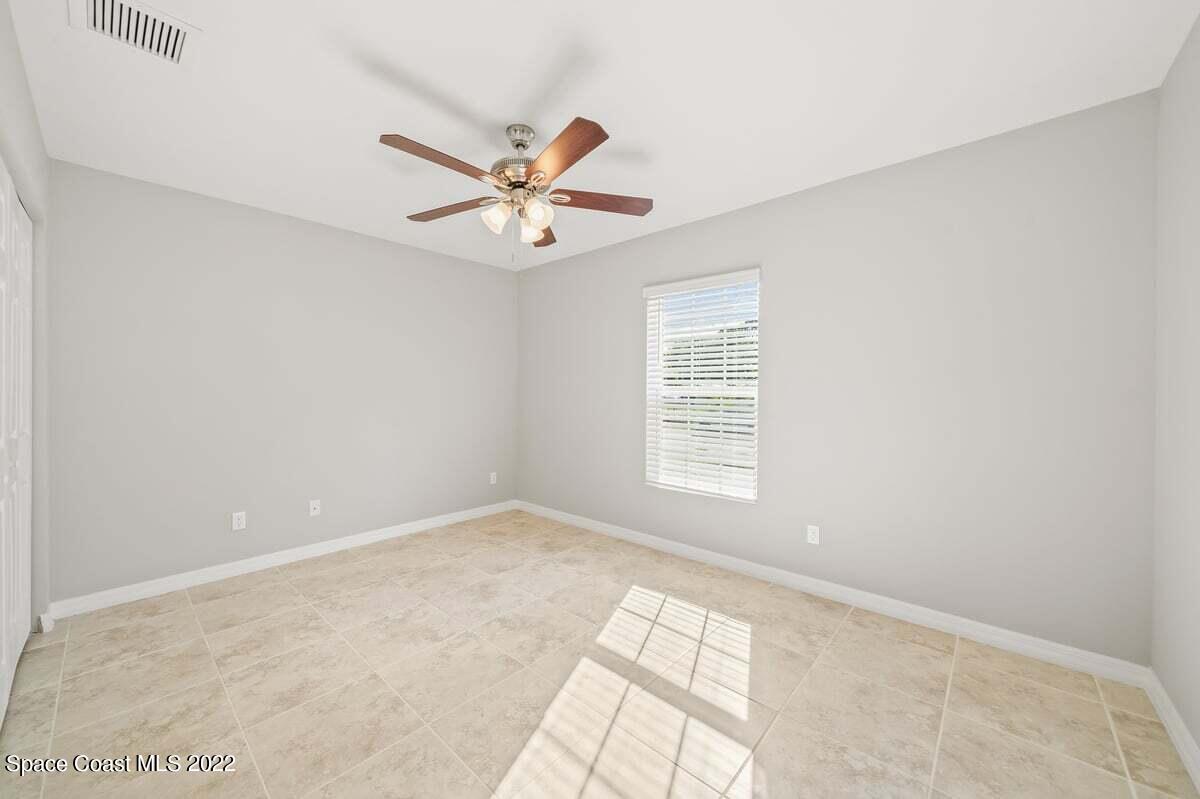 1111 Ver Circle Northeast Palm Bay, FL 32905 - Photo 24 of 30 a view of an empty room with a window