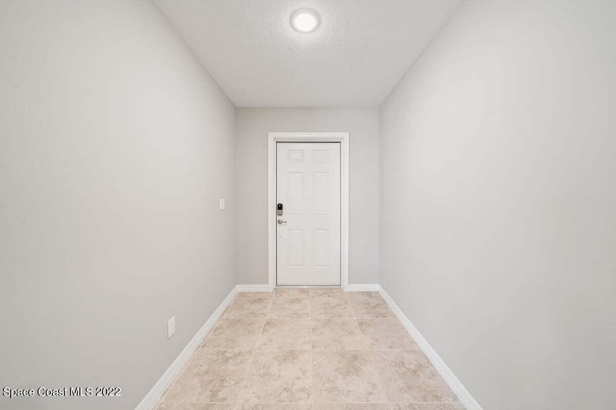 1111 Ver Circle Northeast Palm Bay, FL 32905 - Photo 6 of 30 a view of a room that has a sink