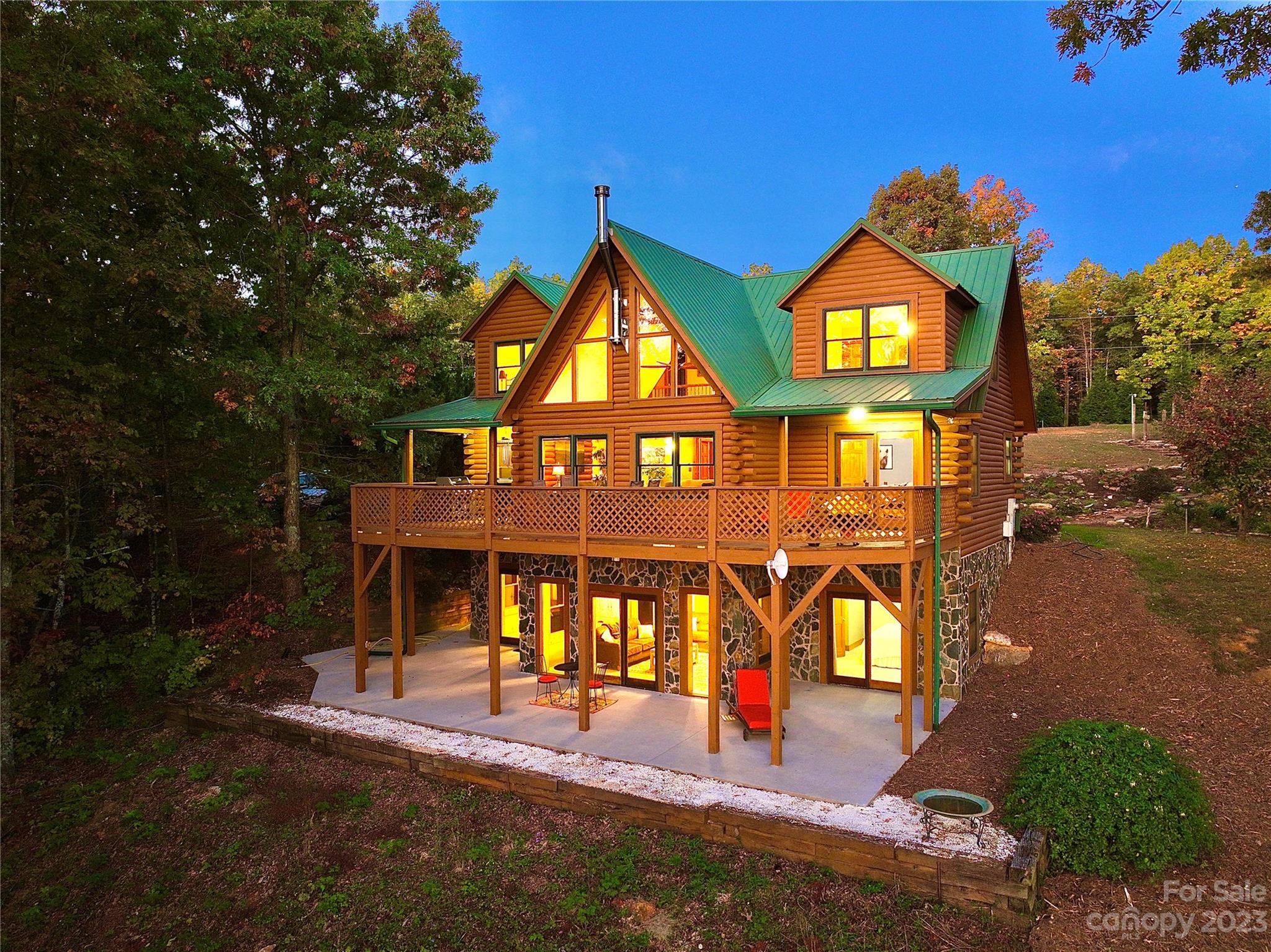 an outdoor space with furniture and garden