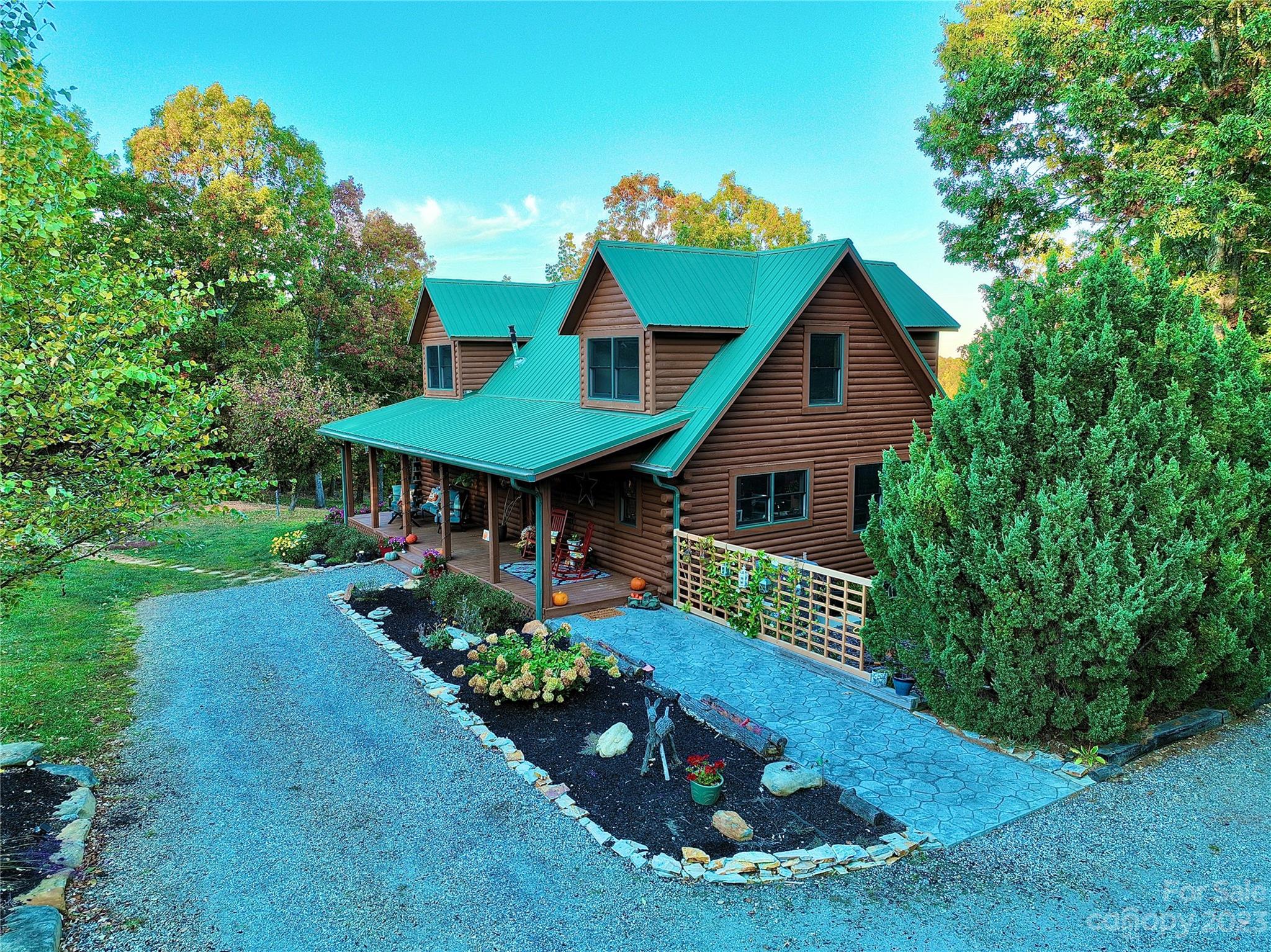 3703 Back Bluff Drive Morganton, NC 28655 - Photo 12 of 48 a front view of a house with a yard