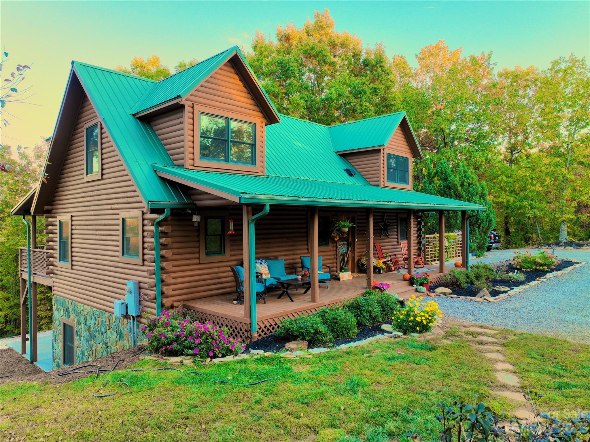 3703 Back Bluff Drive Morganton, NC 28655 - Photo 13 of 48 a front view of a house with garden