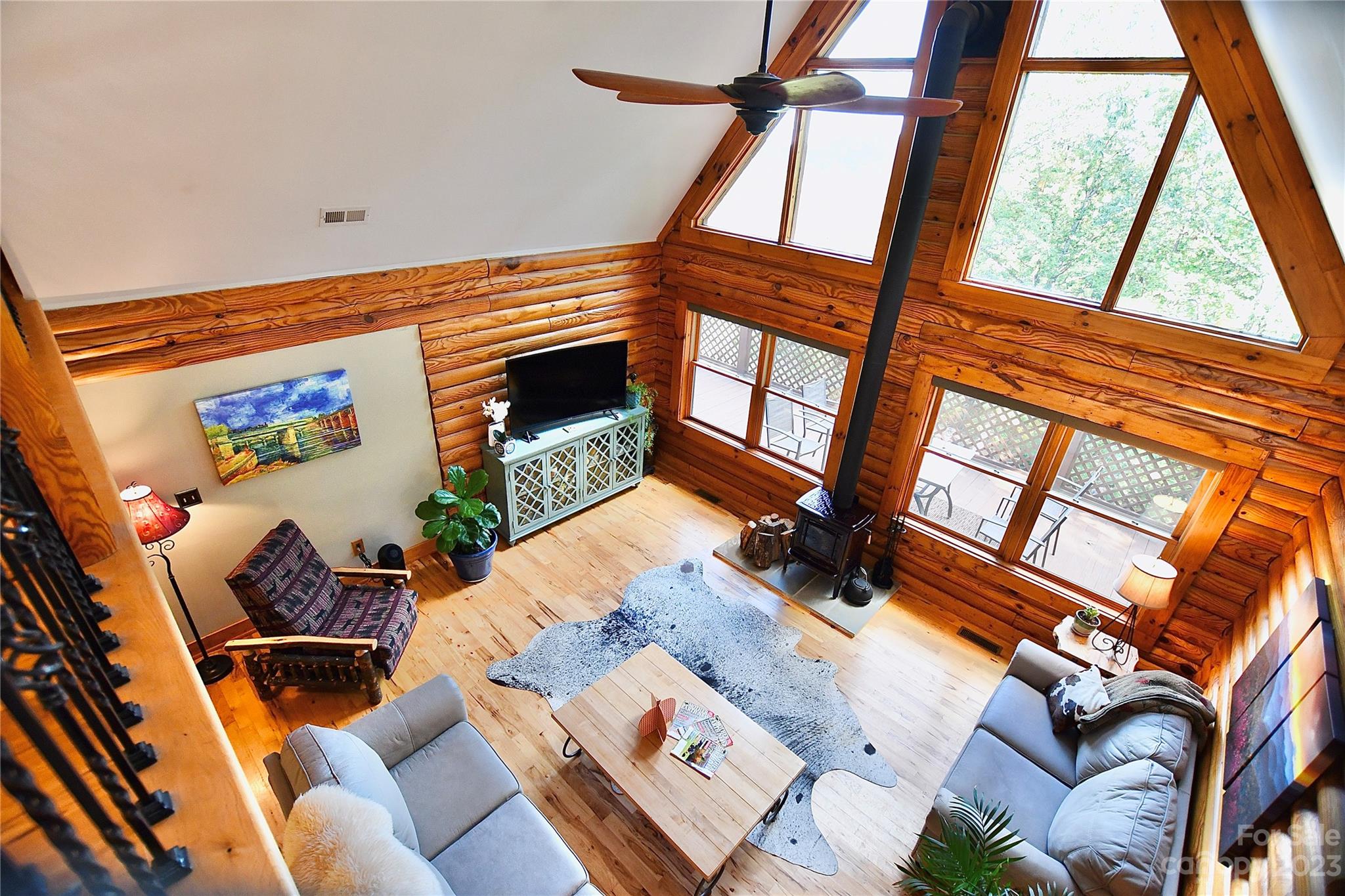 3703 Back Bluff Drive Morganton, NC 28655 - Photo 20 of 48 an outdoor living room with furniture and a floor to ceiling window