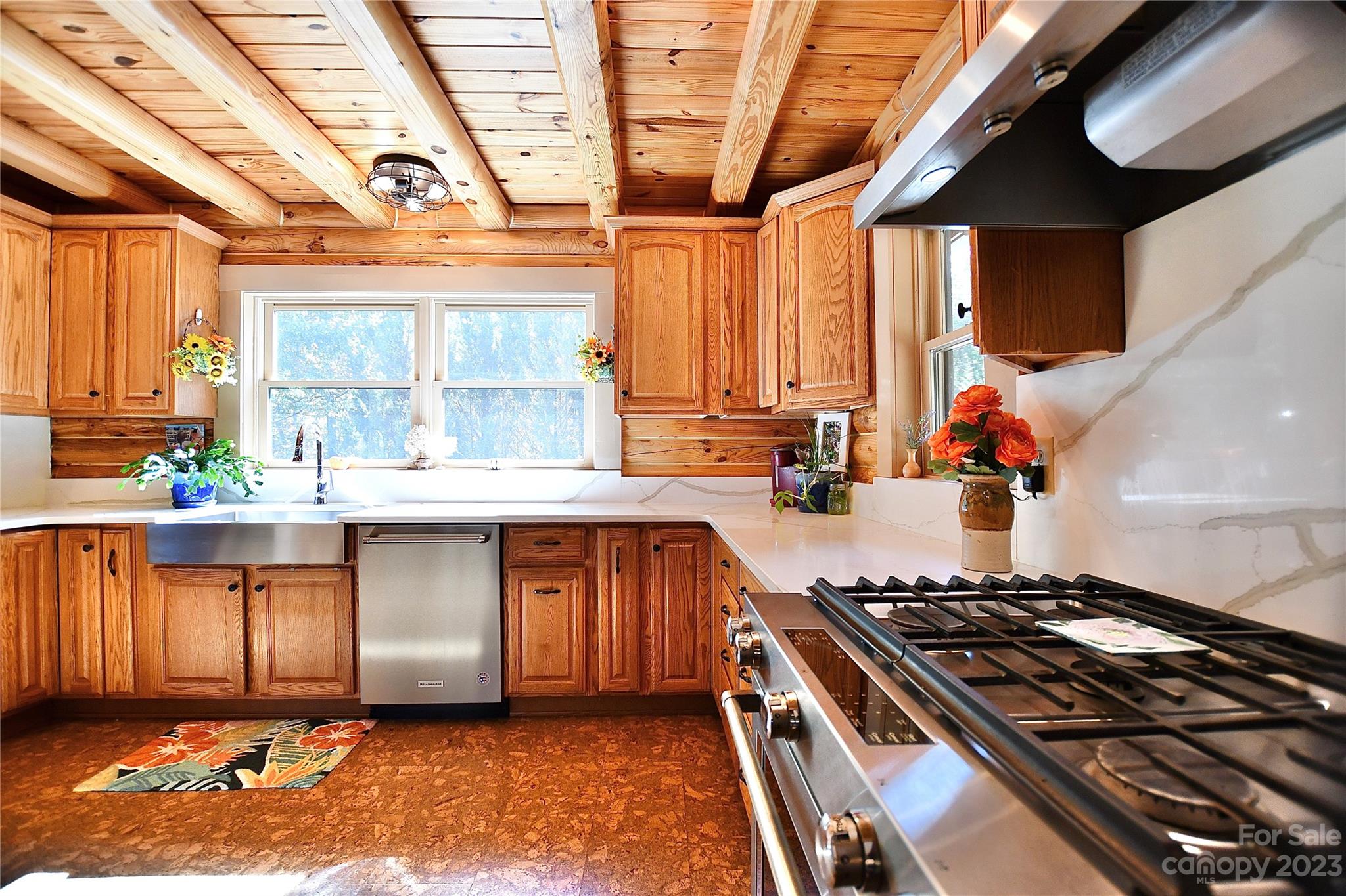 3703 Back Bluff Drive Morganton, NC 28655 - Photo 21 of 48 a kitchen with stainless steel appliances granite countertop a stove a sink and a microwave