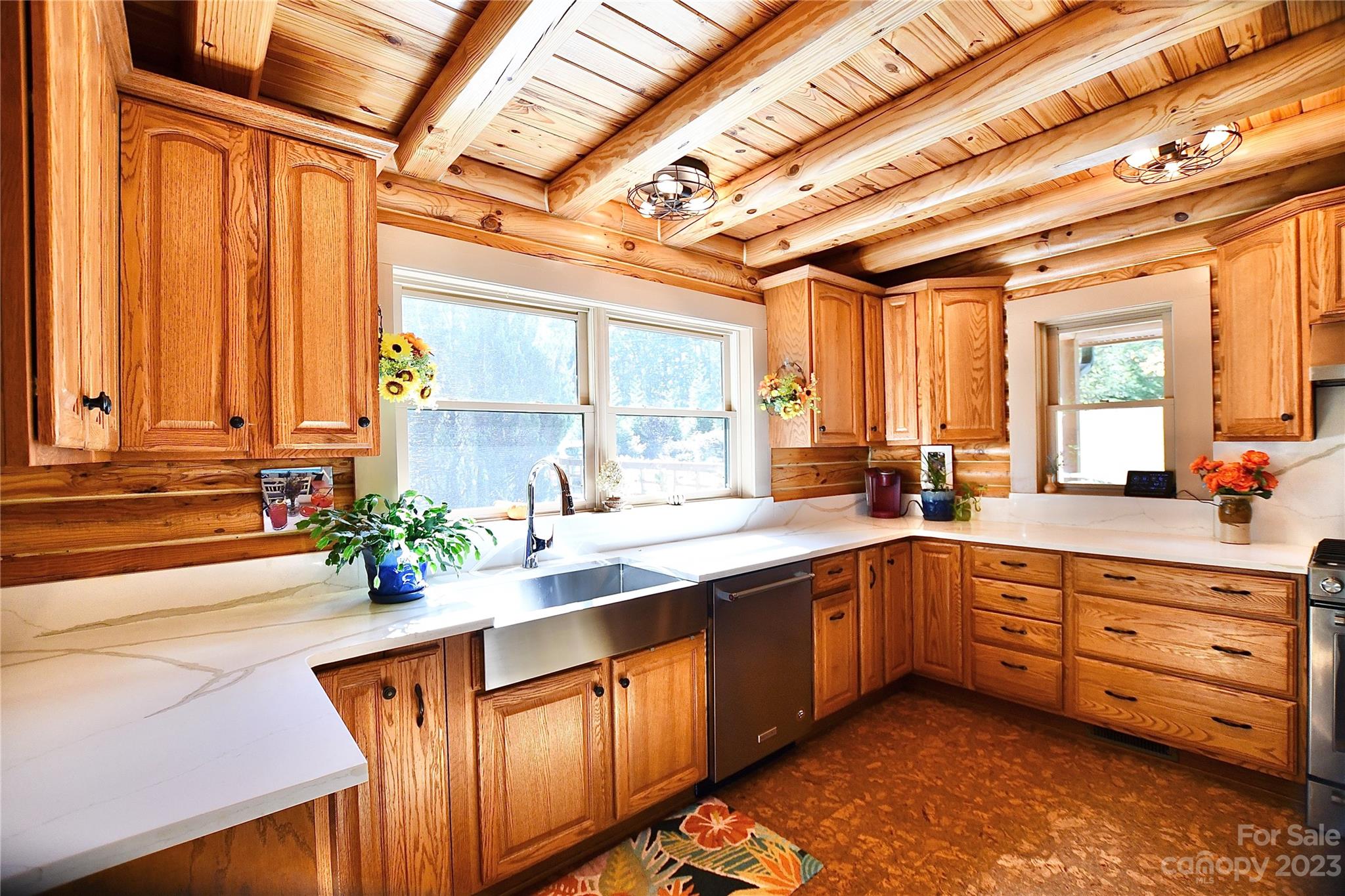 3703 Back Bluff Drive Morganton, NC 28655 - Photo 22 of 48 a kitchen with sink cabinets and wooden floor
