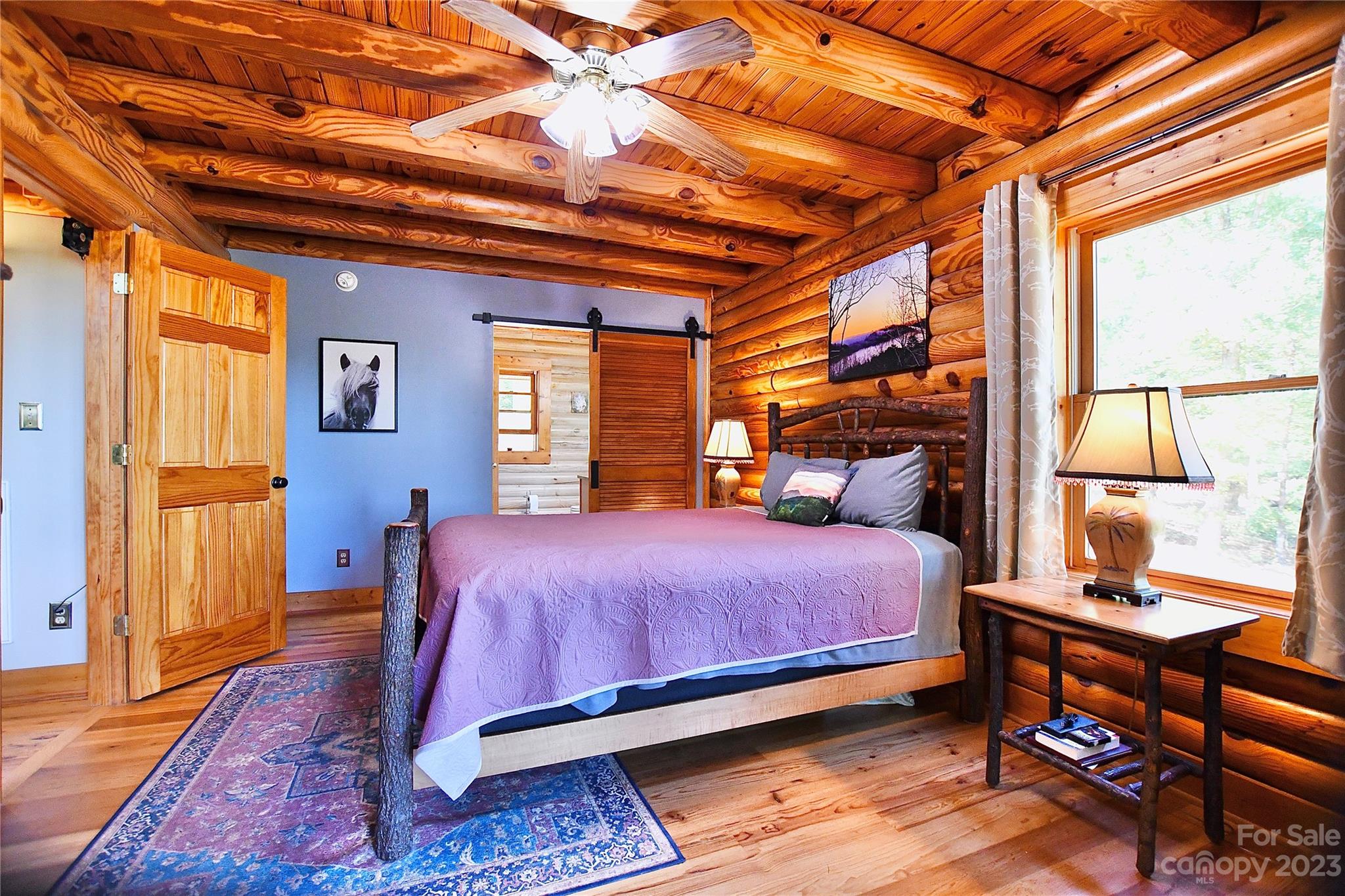 3703 Back Bluff Drive Morganton, NC 28655 - Photo 28 of 48 a bedroom with a bed a dresser next to a window