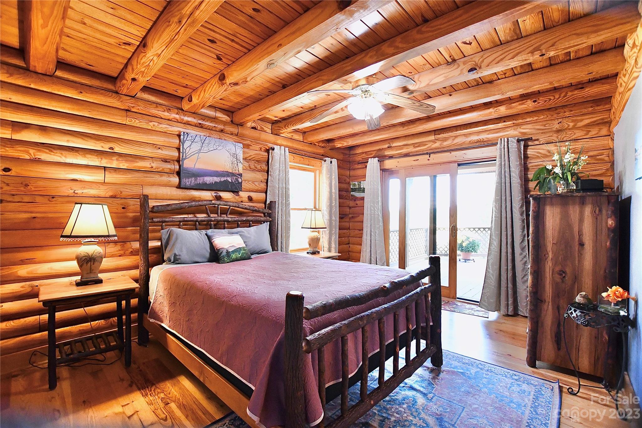 3703 Back Bluff Drive Morganton, NC 28655 - Photo 29 of 48 a bedroom with a bed and wooden floor