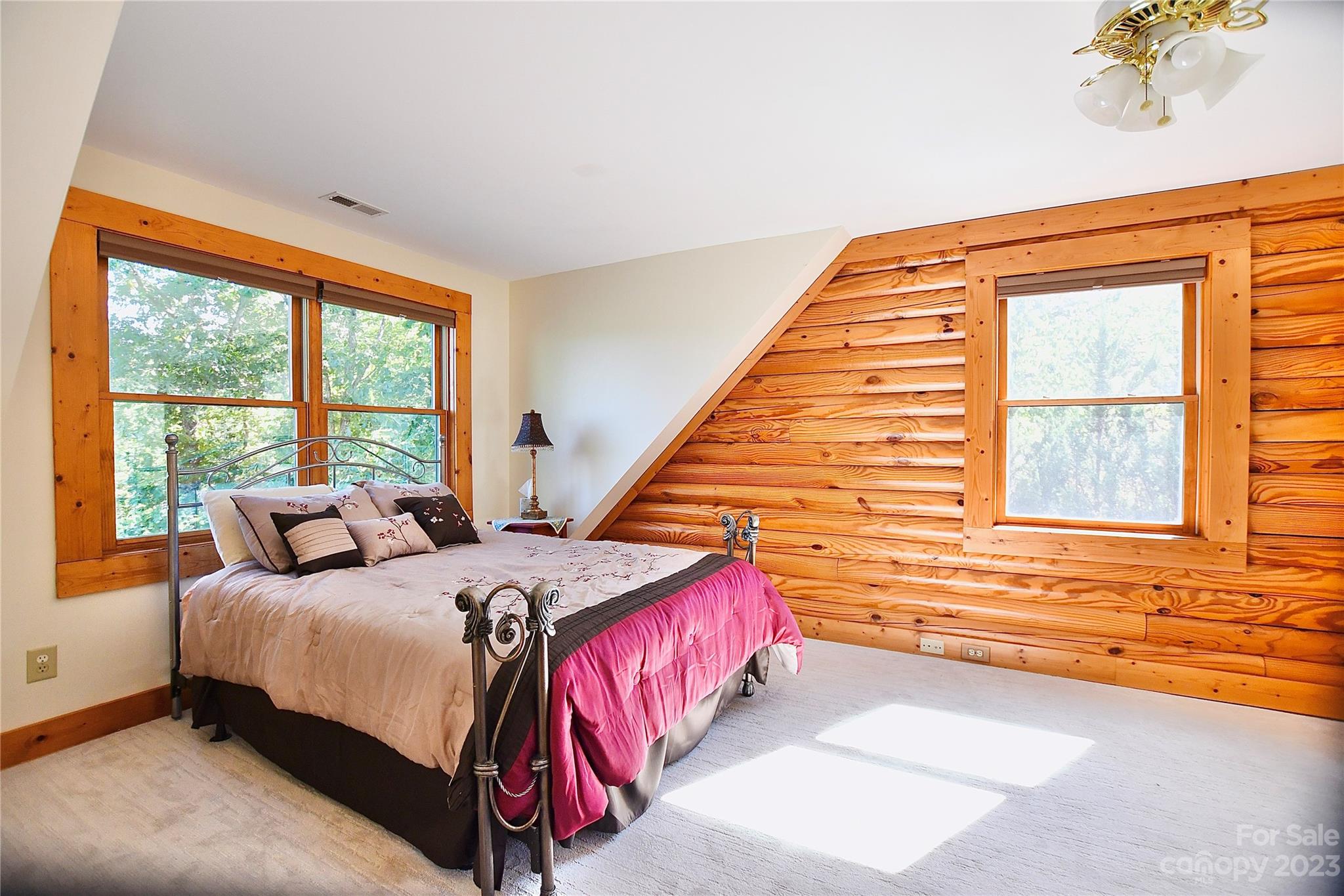 3703 Back Bluff Drive Morganton, NC 28655 - Photo 32 of 48 a bedroom with a bed and a large window