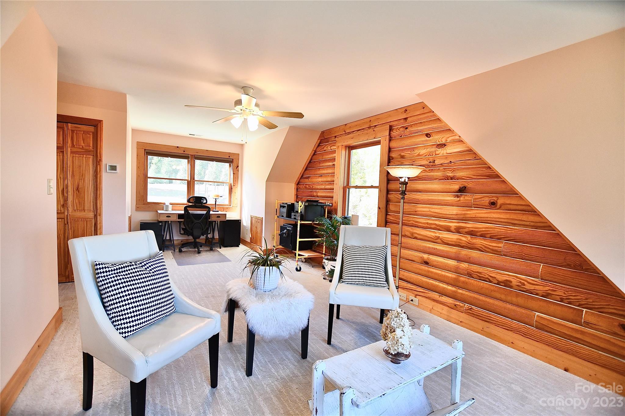 3703 Back Bluff Drive Morganton, NC 28655 - Photo 38 of 48 a view of a livingroom with furniture and a dining table with wooden floor